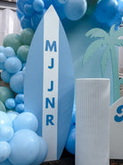 Surf themed birthday party setup with custom balloon garland, beach backdrop, and event styling on the Gold Coast