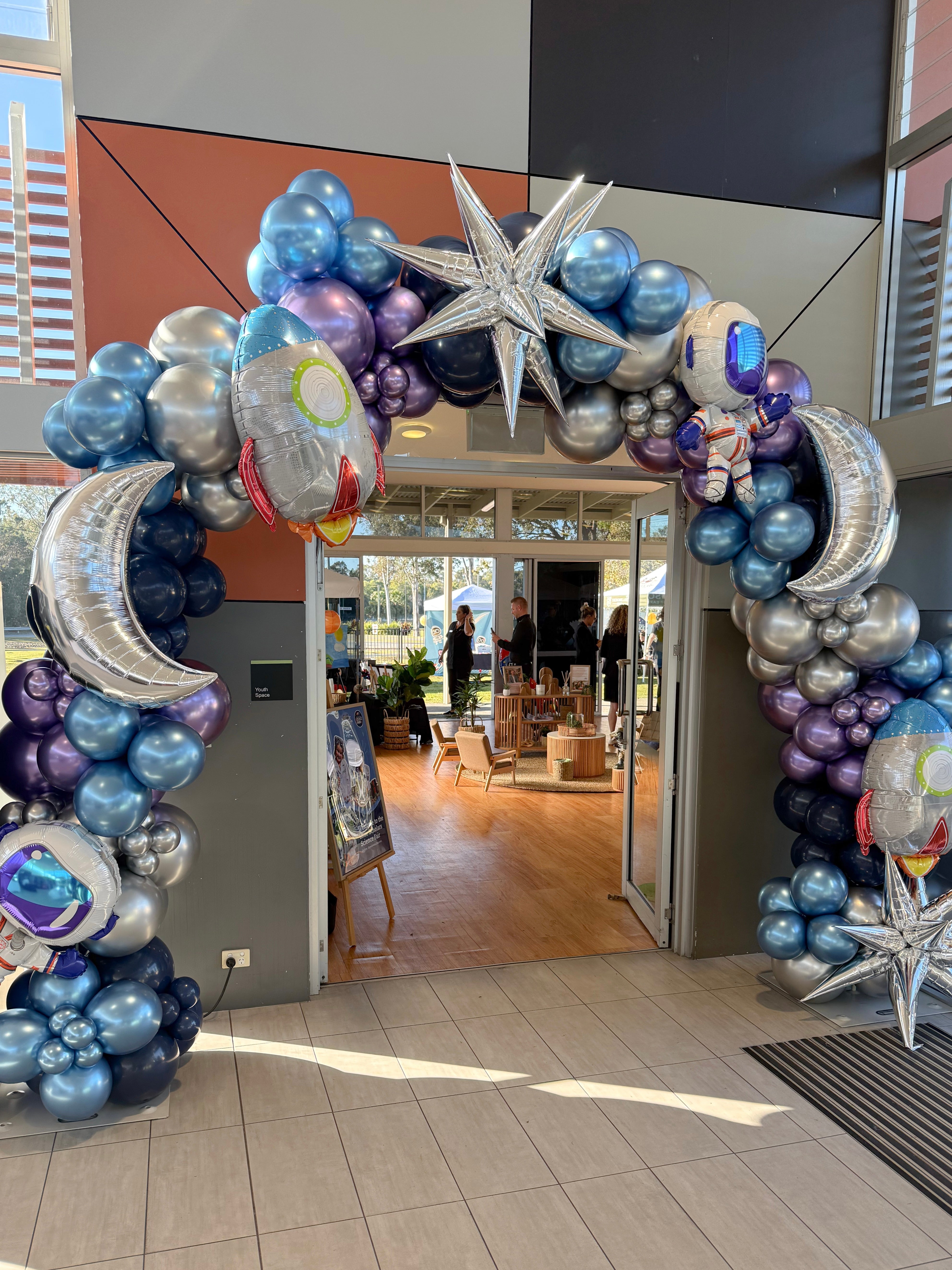Galaxy balloon garland setup for birthday party styling – Gold Coast